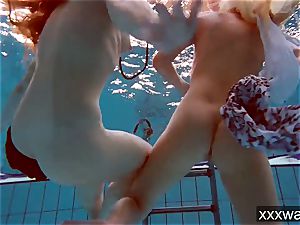 scorching Russian ladies swimming in the pool